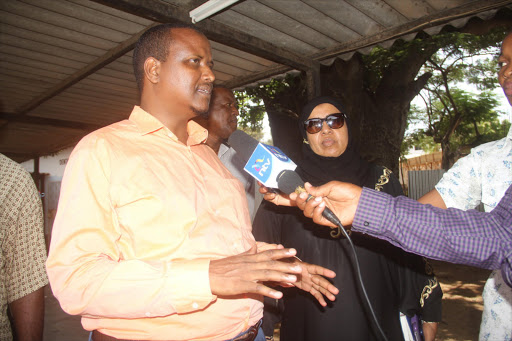 Mombasa county acting executive member for health Abdi Mohamed with regional chief health officer Khadija Shikel at Likoni health centre in Mombasa where they engaged members of the public over reported cases of Hepatitis A. Photo/Elkana Jacob