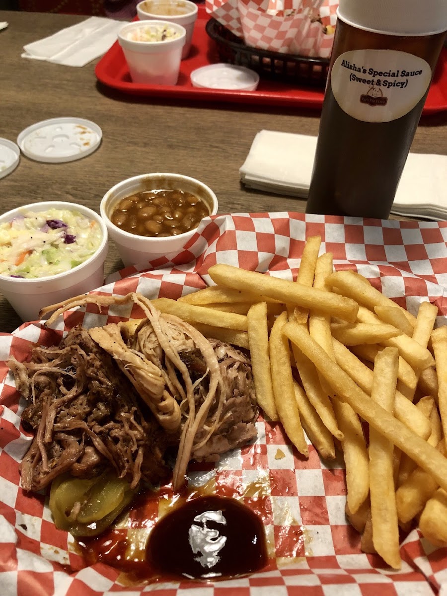 The Half and Half dinner - brisket and pulled pork with fires, baked beans, and coleslaw.