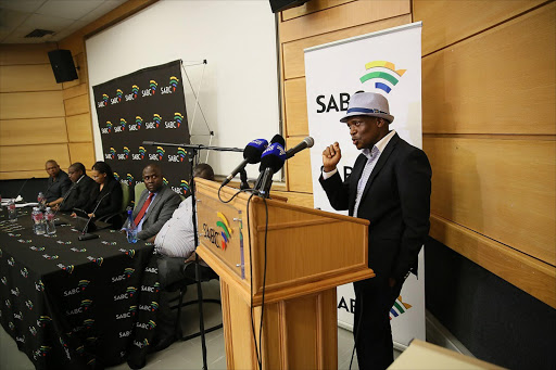 "Hlaudi Motsoeneng remains an employee of the South African Broadcasting Corporation and will be going back to position of group executive of corporate affairs, SABC CEO James Aguma said on Tuesday, in an auditorium at The SABC in Aukland Park, Johannesburg. Also present at the press conference were other board members and legal practitioner Paul Ngobeni. PHOTOGRAPH: ALON SKUY/THE TIMES