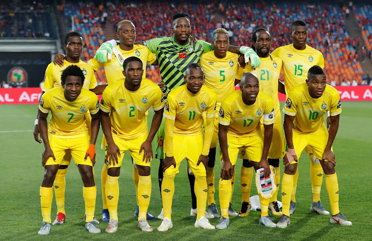 Zimbabwe players pose for a team group photo before the match