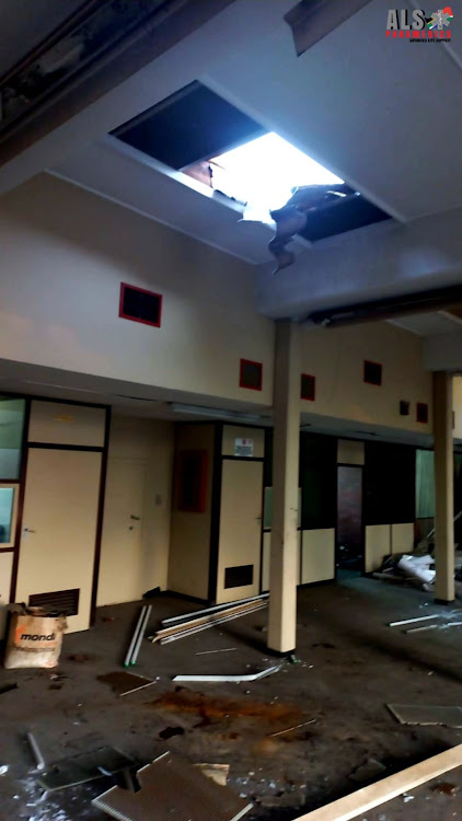 A security guard was seriously injured when he fell through a roof while chasing a suspect at premises south of Durban on Wednesday morning.