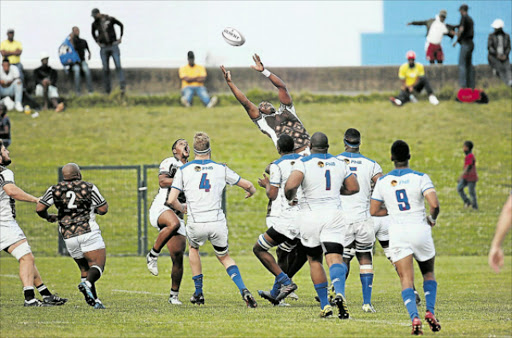 RISE TO THE OCCASION: Bulldogs' Ayabonga Nomboyo jumps for the ball against the Welwitschias at Buffalo City Stadium on Saturday. Picture: MARK ANDREWS