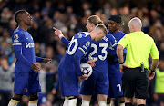 Chelsea's Nicolas Jackson clashes with Noni Madueke as Conor Gallagher intervenes and Cole Palmer prepares to take the penalty in their Premier League win against Everton at Stamford Bridge in London on Monday night.