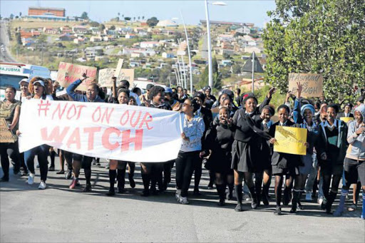 NO MORE: More than one hundred peaceful marchers embarked on 2km walk from Highway Mall to the Mdantsane City Mall yesterday during an awareness campaign due to the recent increase in cases of violence against women and children Picture: SIBONGILE NGALWA