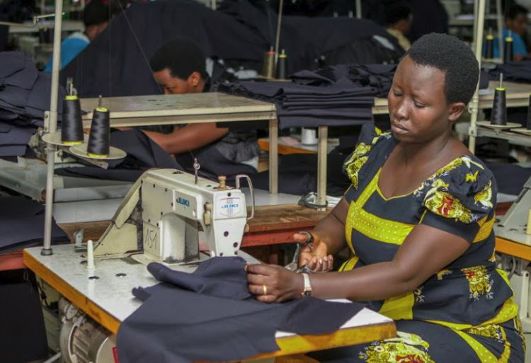 A worker prepares a garment at the the Utexrwa garment factory in Kigali, Rwanda April 17, 2018.