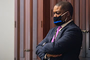 Capitol Police Officer Eugene Goodman watches newly released video footage of the January 6 Capitol attack, during the second day of Trump's second impeachment trial in Washington, U.S.