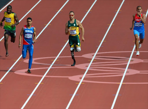 (From L) Jamaica's Rusheen McDonald, Dominican Republic's Luguelin Santos, South Africa's Oscar Pistorius and Russia's Maksim Dyldin compete in the men's 400m heats at the athletics event of the London 2012 Olympic Games on August 4, 2012 in London. Pistorius made Olympic athletics history here on Saturday when he became the first double amputee to competed in an athletics event.