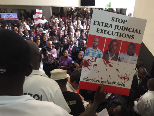 Human rights activists hold demonstrations in a push for justice for murdered human rights lawyer Willie Kimani, his client Josephat Mwenda and taxi driver Joseph Muiruri, July 4, 2016. /ELKANA JACOB