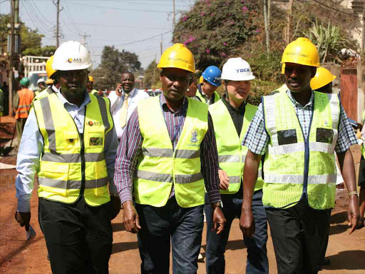 AKS East Africa managing director Amos Siwoi, Kenya Power project manager David Mwaniki with managing director Ben Chumo during the underground cabling project briefing in Nairobi on September 13,2016. PHOTO/ENOS TECHE.