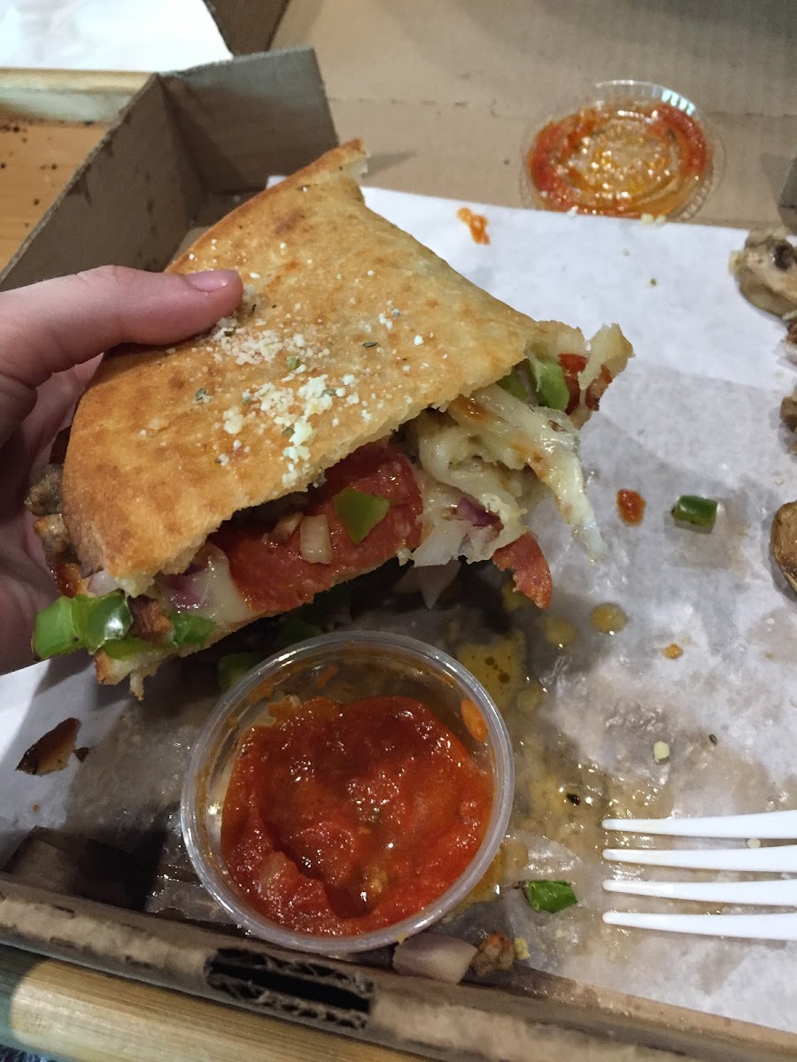 Calzone on folded pizza crust. A bit weird but it tasted good