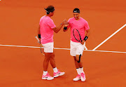 Rafael Nadal and Trevor Noah during their doubles match against Roger Federer and Bill Gates at Cape Town Stadium on February 7 2020.