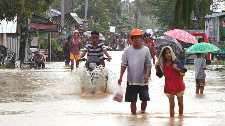 The national disaster agency also confirmed that at least three people had died in the Davao region in the south.