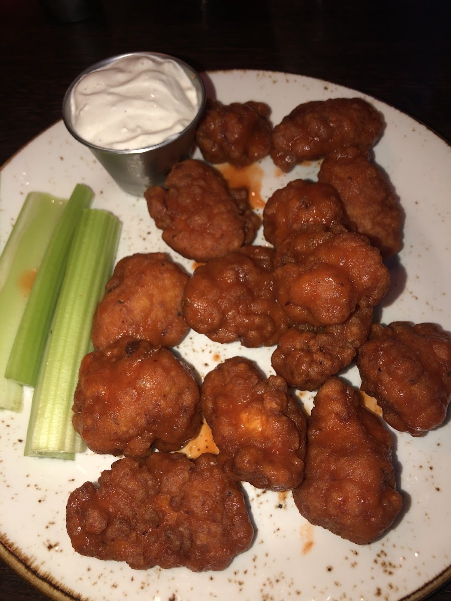 Boneless buffalo wings! Battered with rice flour and fried in a dedicated fryer