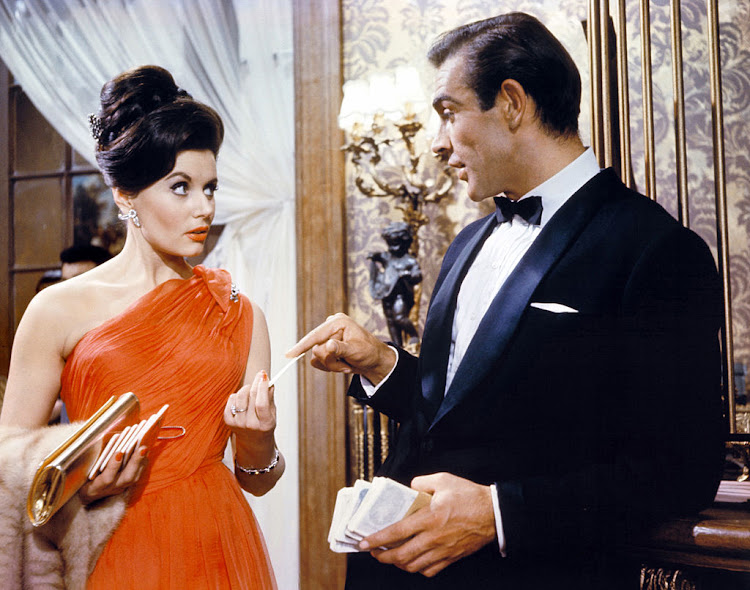 Actor Sean Connery and actress Eunice Gayson on the set of 'Dr. No'.