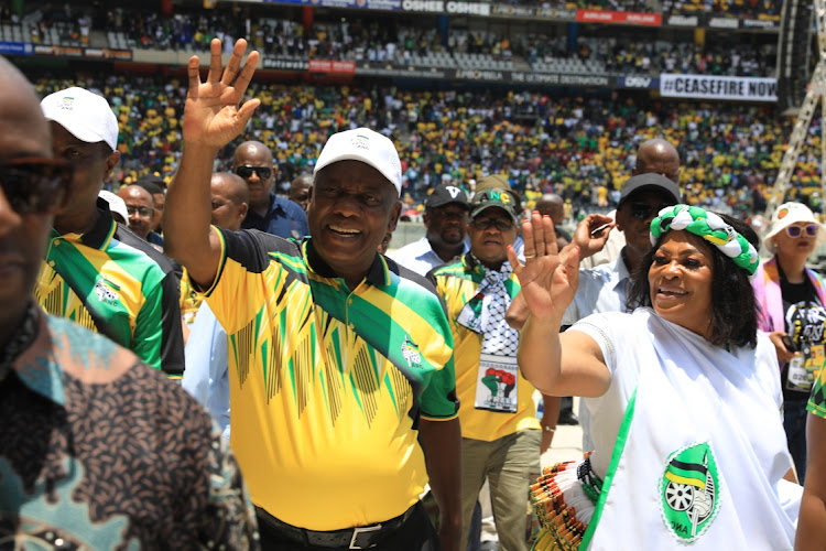 ANC president Cyril Ramaphosa greets supporters at the party's 112th birthday celebrations in Mbombela.
