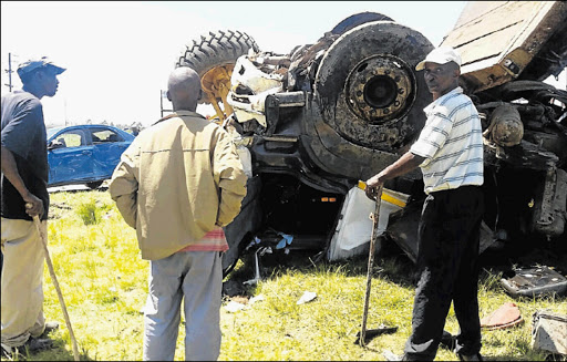 ROAD CARNAGE: Four people died after a vehicle they were travelling in collided with a truck in Ngqeleni near Mthatha yesterday Picture: SUPPLIED