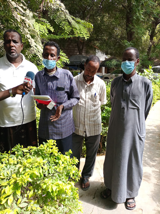 Garissa peace secretary Hassan Osman addressing the press at a Garissa hotel on Tuesday about the teaching crisis.