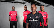 Orlando Pirates players model their new Adidas home and away kits for the upcoming 2018/19 Absa Premiership season. 
