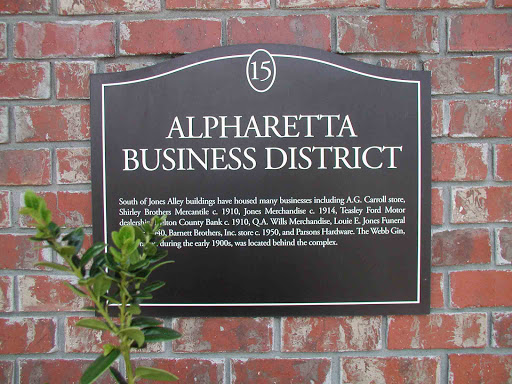 South of Jones Alley buildings have housed many businesses including A.G. Carroll store, Shirley Brothers Mercantile c. 1910, Jones Merchandise c. 1914, Teasley Ford Motor dealership, Milton...