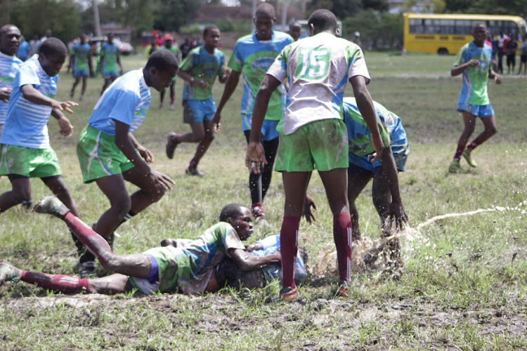 Kitondo boys (blue) taking on Marafa boys (white) in the boys rugby 15s