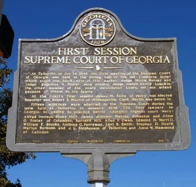 At Talbotton on Jan. 26, 1846, the first meeting of the Supreme Court of Georgia was held in the dining hall of the old Clairborne Hotel which stood one block west of this marker. Judge Hiram...