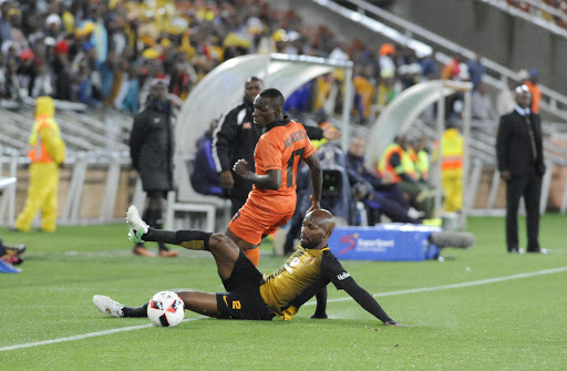 Ramahlwe Mphahlele of Kaizer Chiefs and Rodney Ramagalela of Polokwane City fights for the ball during the Absa Premiership match at New Peter Mokaba Stadium on May 13, 2017 in Polokwane, South Africa. (Photo by Philip Maeta/Gallo Images)