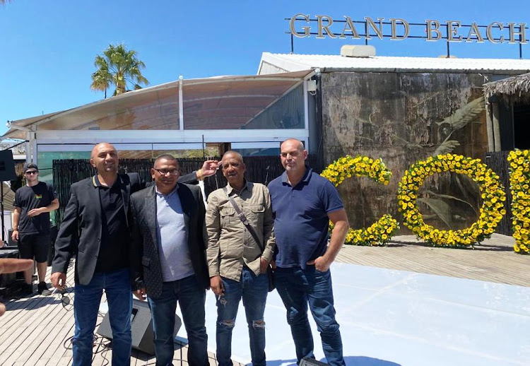 Nafiz Modack, Colin Booysen, Ashley Fields and Jacques Cronje outside Grand Africa Cafe and Beach on February 20 2020 after they were acquitted of extorting the establishment at the V&A Waterfront in Cape Town.