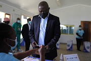 Deputy president David Mabuza prepares to cast his vote at the Ajuri Farm in Barberton, Mpumalanga.