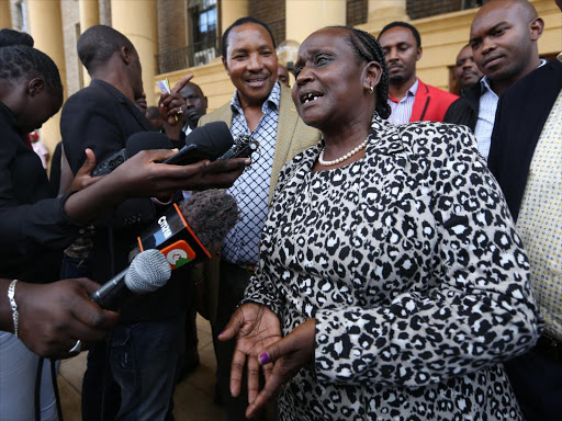 A file photo of Samburu woman representative Maison Leshoomo addressing journalists at Milimani law courts.