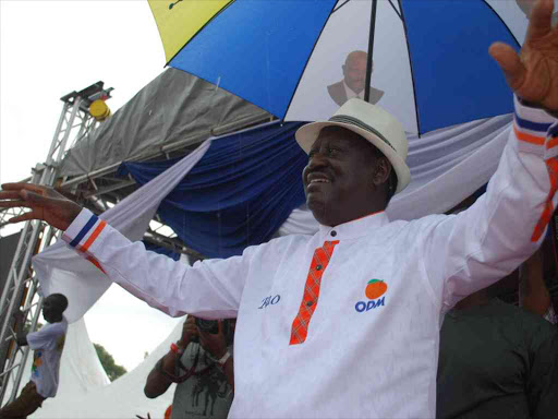 NASA leader Raila Odinga waving to a crowd in a rally at Afraha Stadium Nakuru./FILE