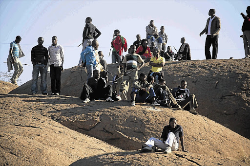 Striking Lonmin workers meeting on a hilltop near the Marikana informal settlement in North West at the height of the Lonmin strike. File photo.
