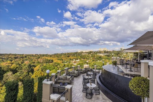 The terrace of Flames restaurant at The Westcliff Four Seasons Hotel has an extraordinary view.