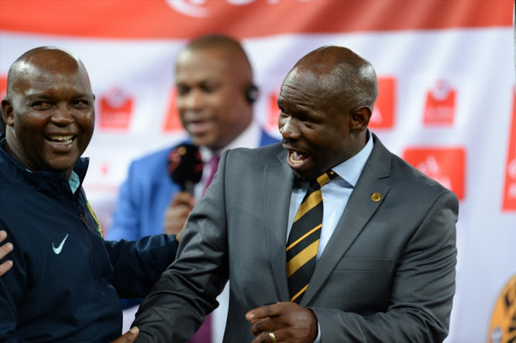 A file photo of Pitso Mosimane and Steve Komphela sharing a light moment during the Absa Premiership match.