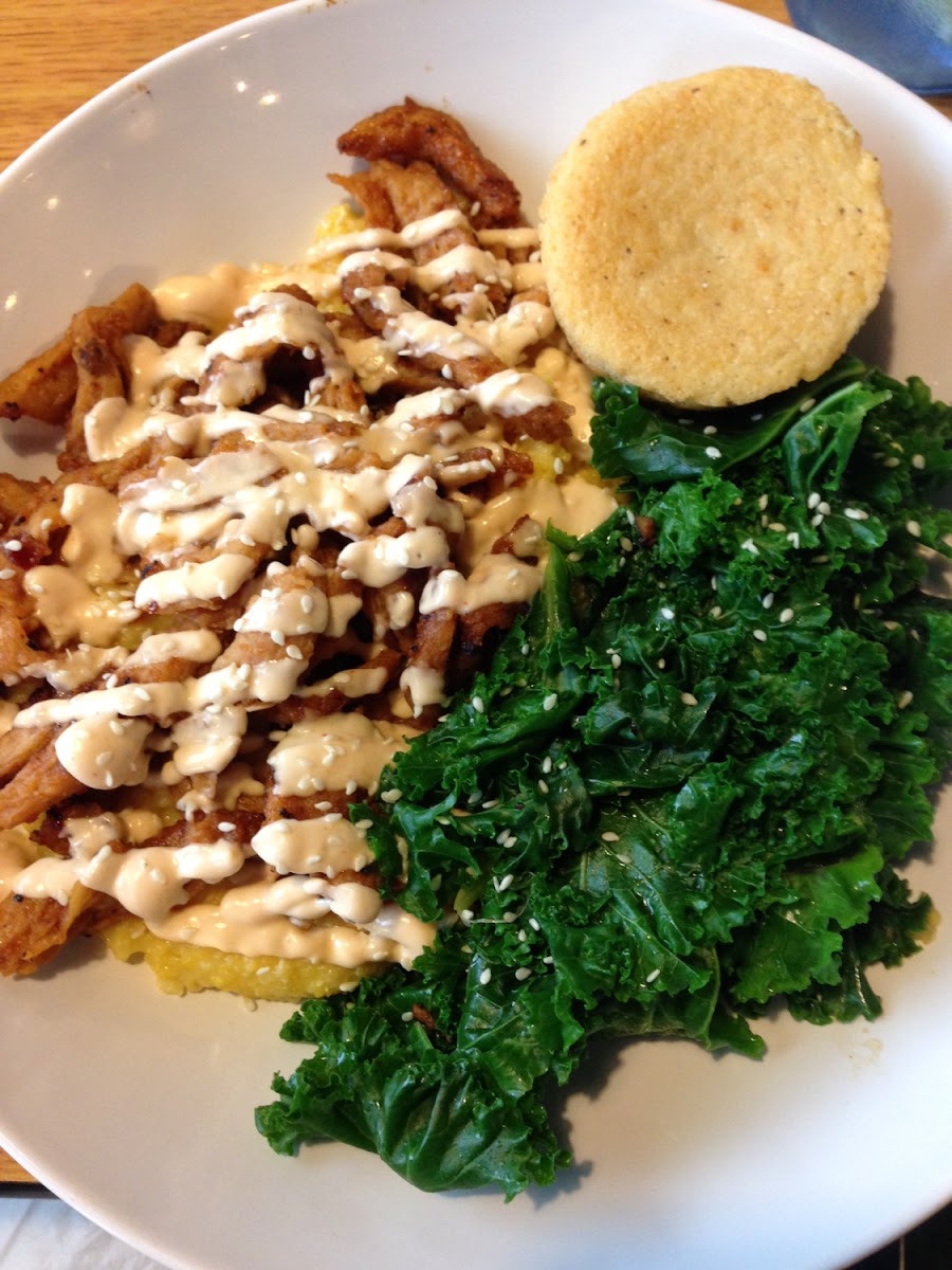 BBQ soy curls with kale, grits, and a corn muffin. All GF!