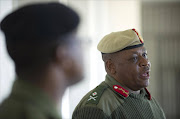 Lesotho's army Major General Lineo Poopa after weapons (unseen) confiscated from the police after the military raided police installations are put on display. Picture Credit: AFP