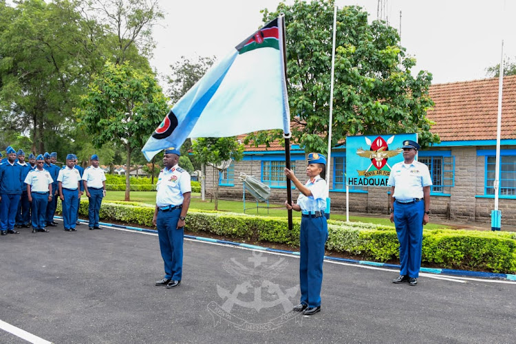Major General Fatuma Ahmed waves the Kenya Airforce flag after as she assumed her role as the KAF Commander at a ceremony held at the KAF Headquarters in Nairobi, May 9, 2024.