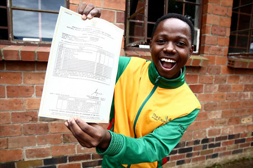 Mnqobi Nzuza of Menzi High School is over the moon after achieving seven straight A's. His class of 2016 again achieved 100% pass rate. Picture: THULI DLAMINI