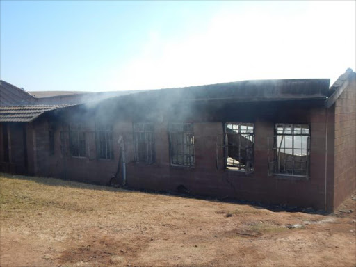 An administration housing school records, stationery and expensive equipment including around 15 new computers was gutted in a mysterious fire at Jongintaba SSS in Mqhekezweni village outside Mthatha during the early hours of the this morning. Picture: SIKHO NTSHOBANE