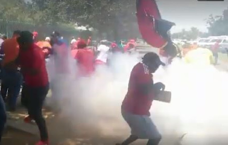 Police have fired stun grenades to break up a clash with EFF protesters outside Hoërskool Overvaal in Gauteng.