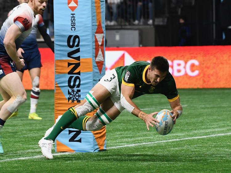 Impi Visser scores a try for the Blitzboks in their HSBC Vancouver Sevens match against Great Britain at BC Place in Vancouver, Canada on Friday.