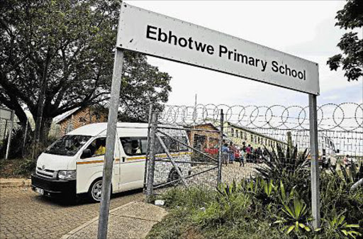 INNOCENT VICTIMS: : FEBRUARY 25, 2016 Children had been dropped off and were waiting outside Mdantsane’s Ebhotwe Primary School for the gates to open when the taxi car plowed into them . A total of 15 were injured, some of them seriously pupils were primary school pupils were yesterday left injured after a small taxi driver drove into them while they were waiting outside the school waiting for the gates to be opened Picture: MARK ANDREWS