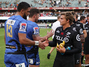 Curtis Rona of Western Force with Pat Lambie (R) of the Cell C Sharks during the Super Rugby match at Growthpoint Kings Park on May 06, 2017 in Durban, South Africa.