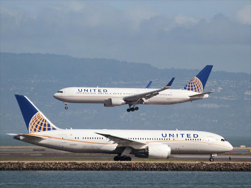 A United Airlines Boeing 787 taxis as a United Airlines Boeing 767 lands at San Francisco International Airport, San Francisco, California, US on February 7, 2015. /REUTERS