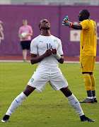 Ivory Coast's Jonathan Kodjia reacts after missing a chance on goal during the friendly football match between Ivory Coast and Uganda at New York University Stadium in Abu Dhabi on January 11, 2017.