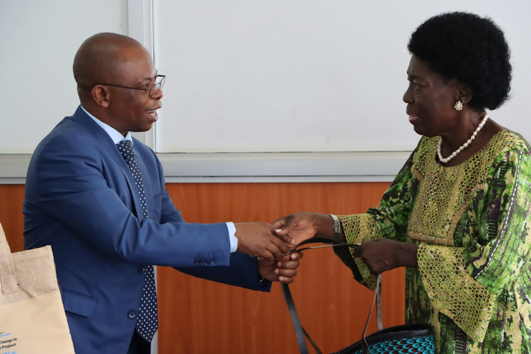 Uganda's First Deputy PM and Minister for EAC Rebecca Kadaga receives a gift from Lake Victoria Basin Commission executive secretary Dr Masinde Bwire May 3, 2024.