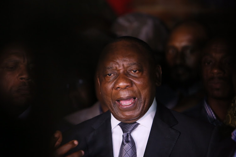 President Cyril Ramaphosa speaks outside the home of the late Winnie Madikizela-Mandela in Soweto on April 2 2018.