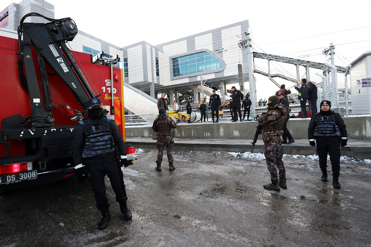 Turkish police stand guard near the scene of a high speed train crash in Ankara, Turkey December 13, 2018.