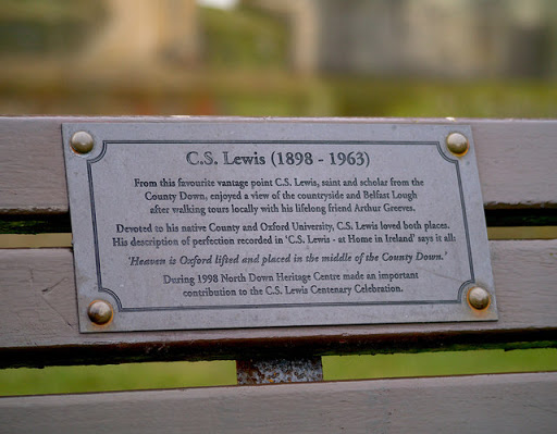 Plaque to the author C.S. Lewis on a bench in front of Bangor Town Hall Link . © Copyright Rossographer and licensed for reuse under this Creative Commons Licence . Submitted via Geograph