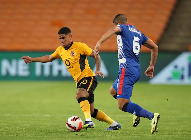 Keagan Dolly of Kaizer Chiefs is challenged by Travis Graham of Maritzburg United in the DStv Premiership match at FNB Stadium in Johannesburg on December 22, 2021.