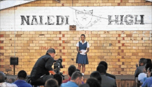 HAVING A SAY: Kelly Baloyi addresses the audience during the filming of an FNB advert campaign at Naledi High School in Soweto Photo: Matthews Baloyi